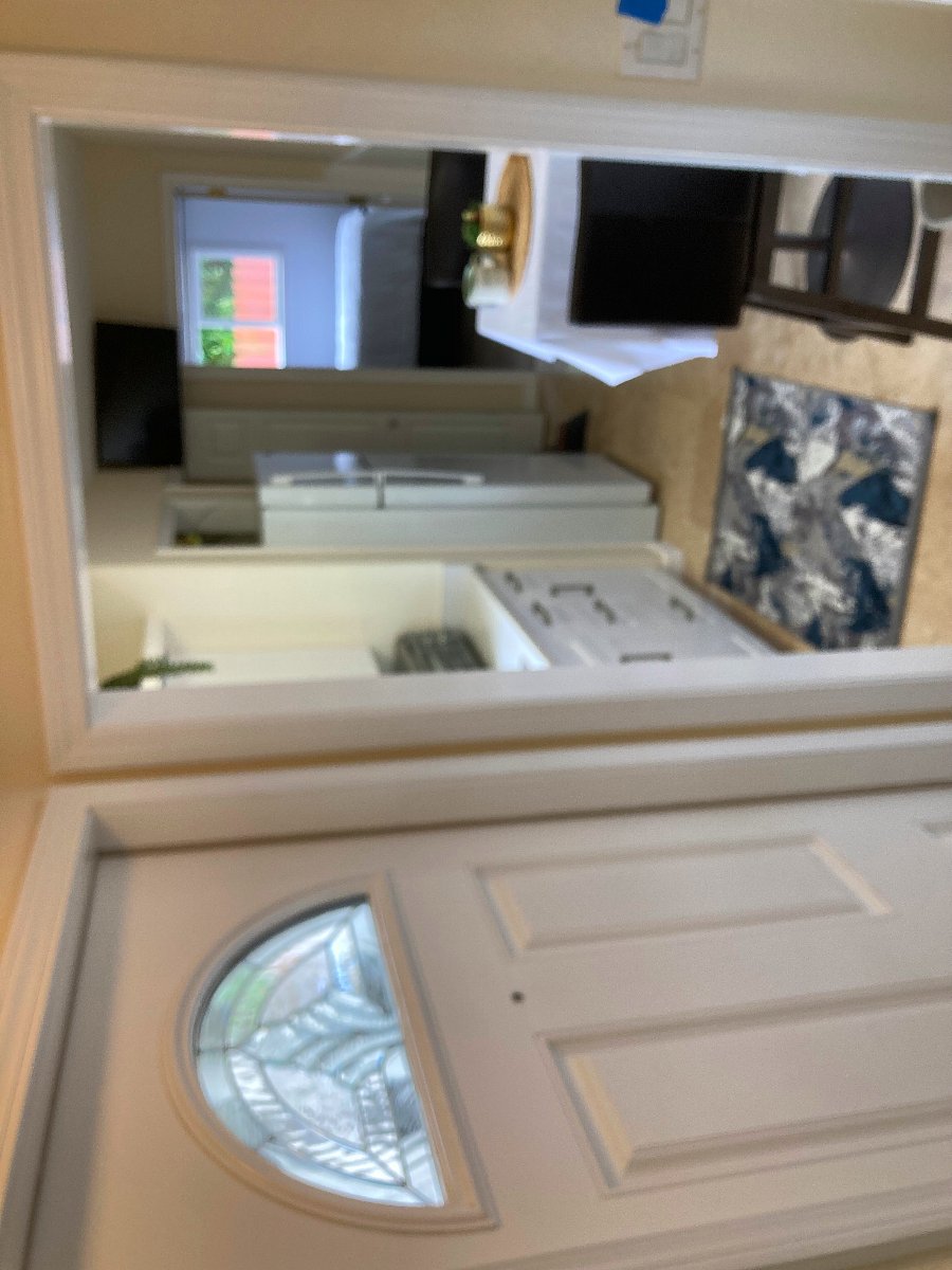 Entrance door to one-bedroom and eating table