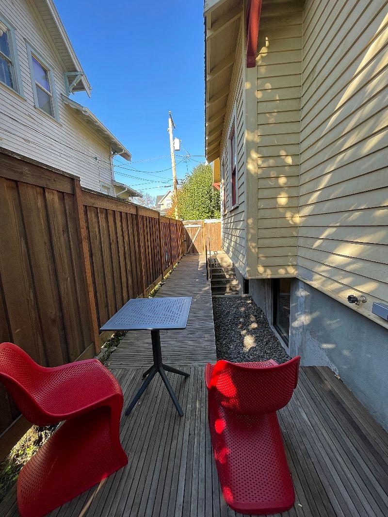 Outside patio with chairs to sit and enjoy the weather when it is good