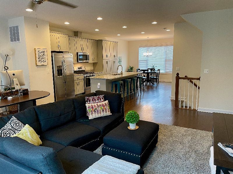 Big sectional sofas and a TV with cable and streaming options leave you lots of room for relaxing.