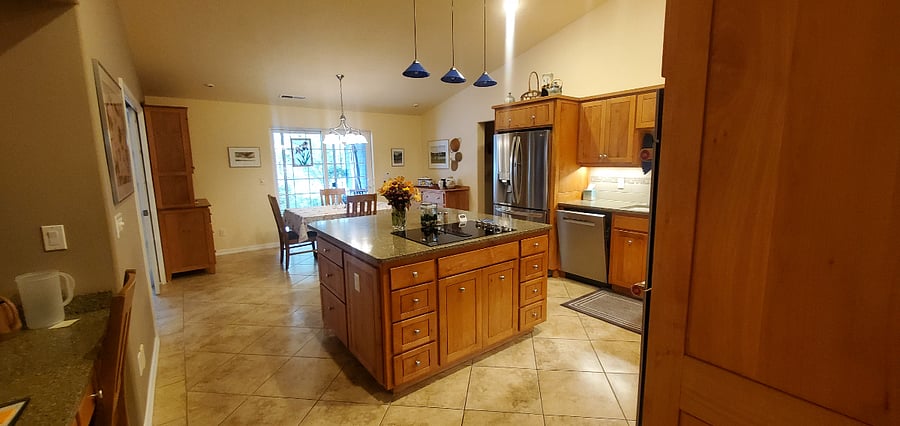 Large kitchen with enough room to walk around the appliances when the doors are open