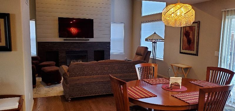 Informal dining area and great room on main floor of the home.