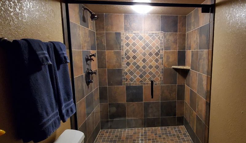 The private bathroom in the guest quarters includes a very spacious walk-in shower.