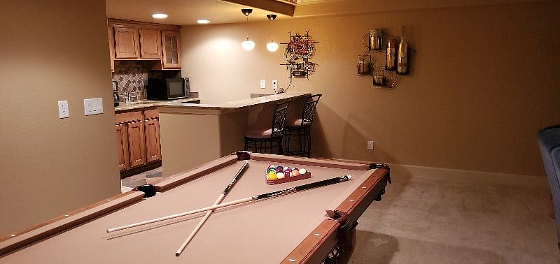 This unit includes approximately 800SF of spacious living including bedroom, private bath, wet bar/kitchenette, and living area.