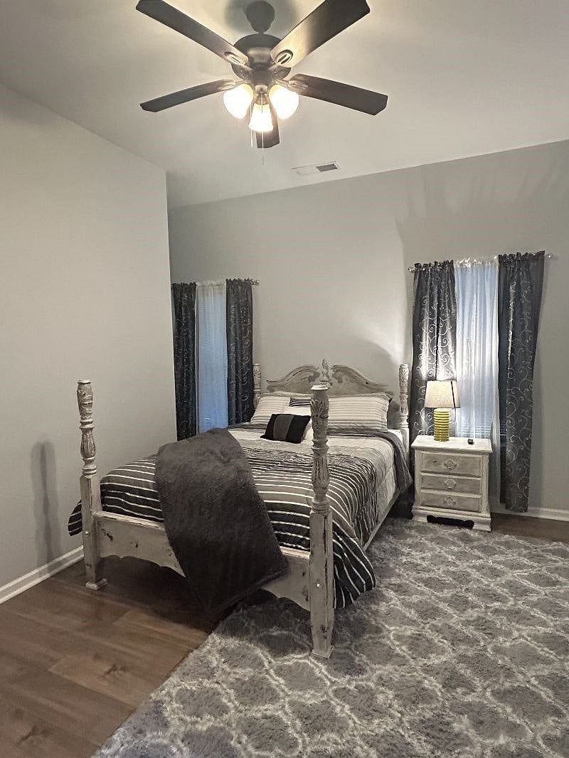 Bedroom 1 with queen size bed and TV