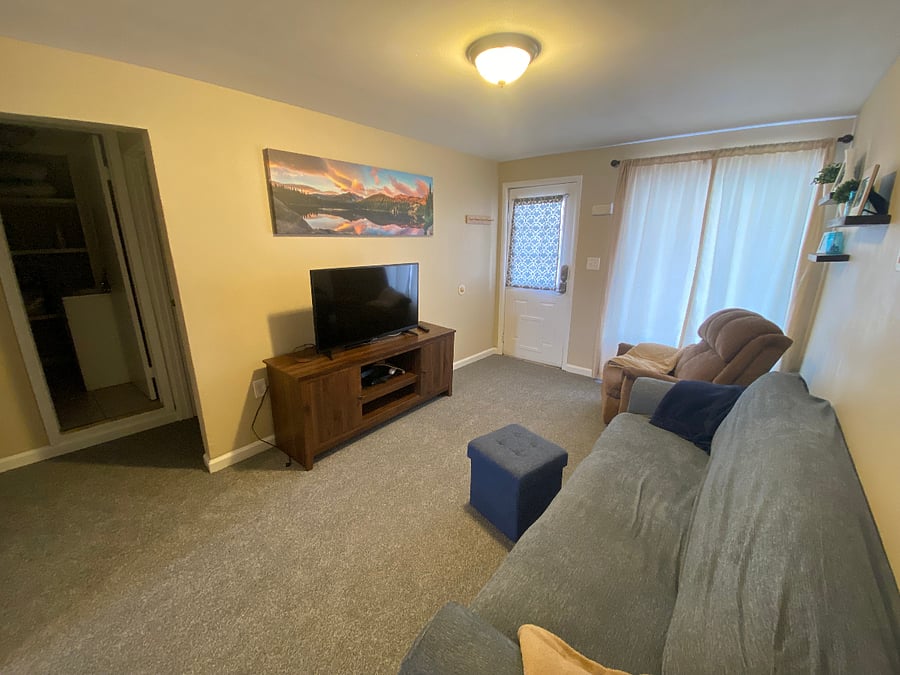 Couch, recliner, 40in smart TV.