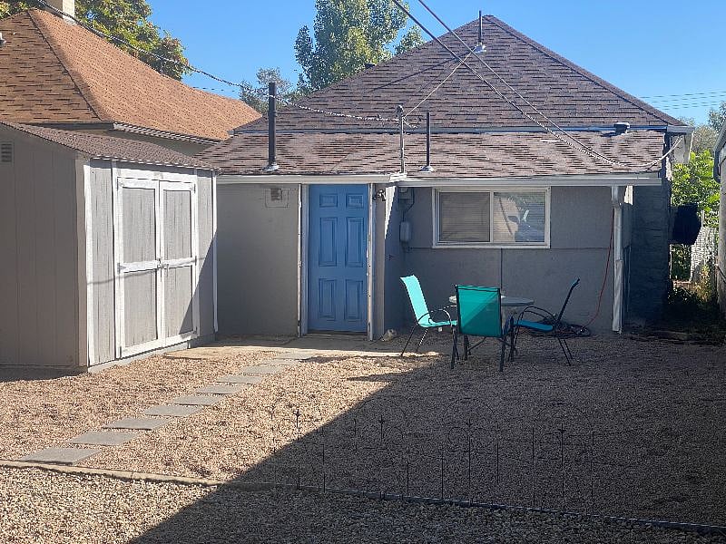 Enjoy the no maintenance gravel backyard with paver walkway to where your car is parked steps away