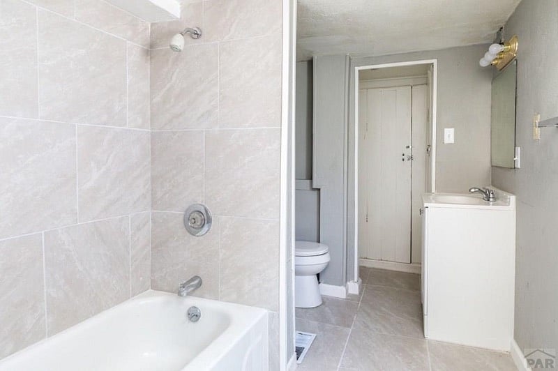 Older shower head in this photo - next photo shows new one