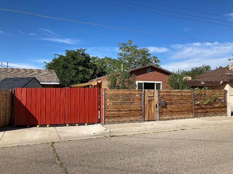 Long driveway with latching gates