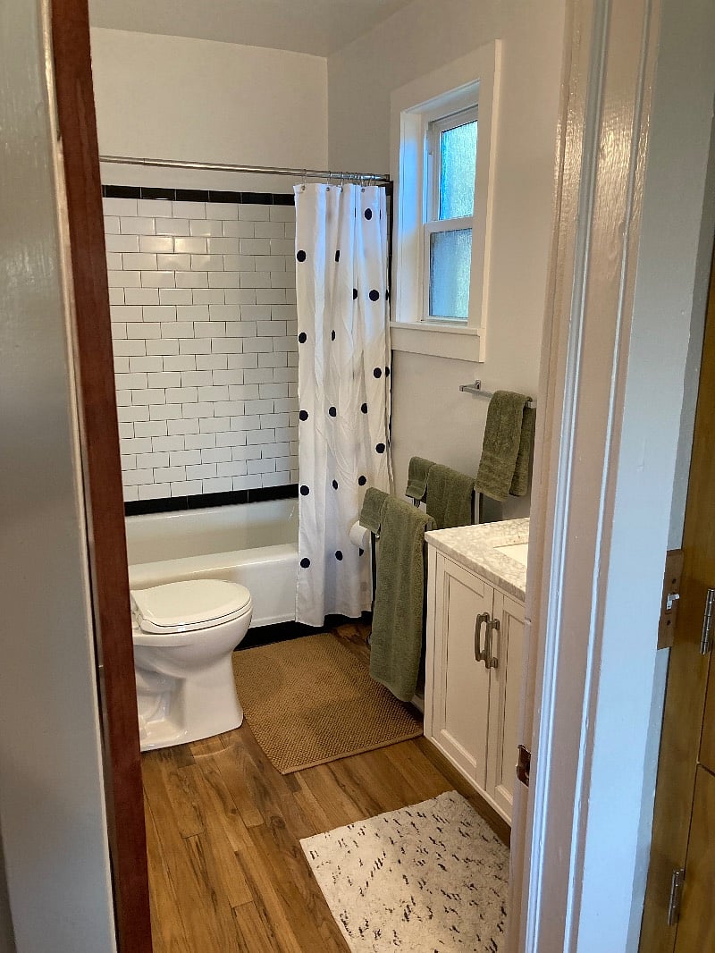 Fully restored bathroom with carrera marble vanity