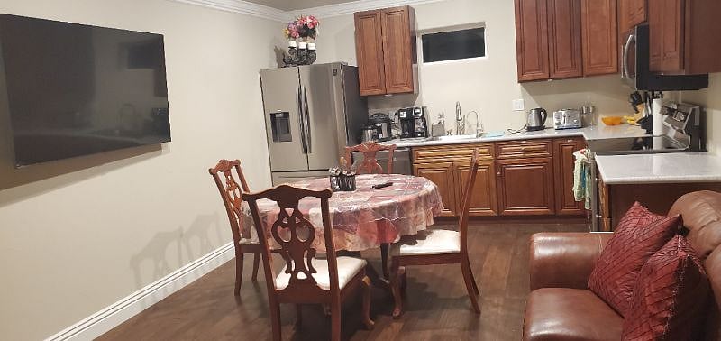 Relaxing living area with attached kitchen with everything available.