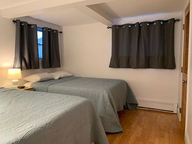 1st bedroom with two full beds