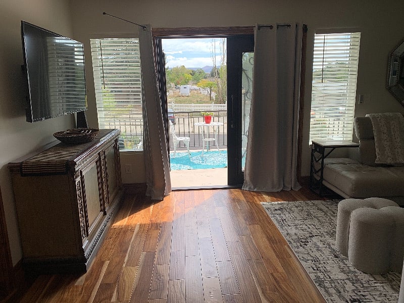 Beautiful wrought iron French doors leading to outside private deck