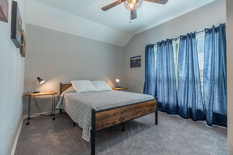 3rd Bedroom at Front of Home. Ceiling Fan and Blackout Curtains with Blinds