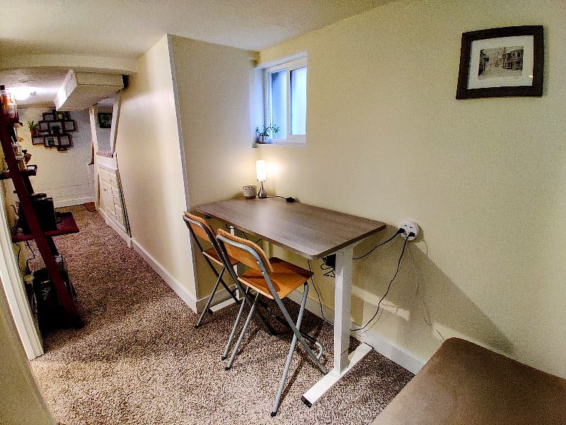 Sit / stand desk automatically raises and lowers for working from home.