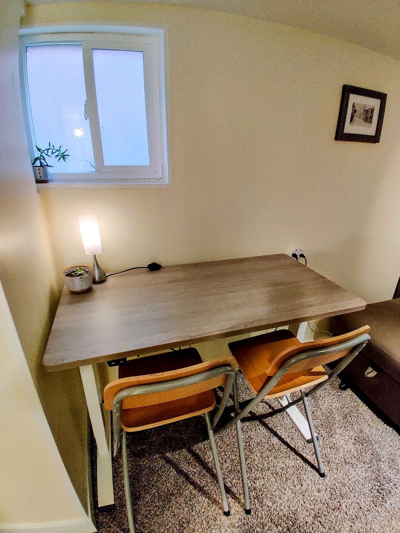 Sit / stand desk automatically raises and lowers for working from home.