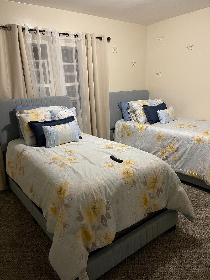 Bed configuration can be changed upon request. 40 inch smart Tv on the wall.