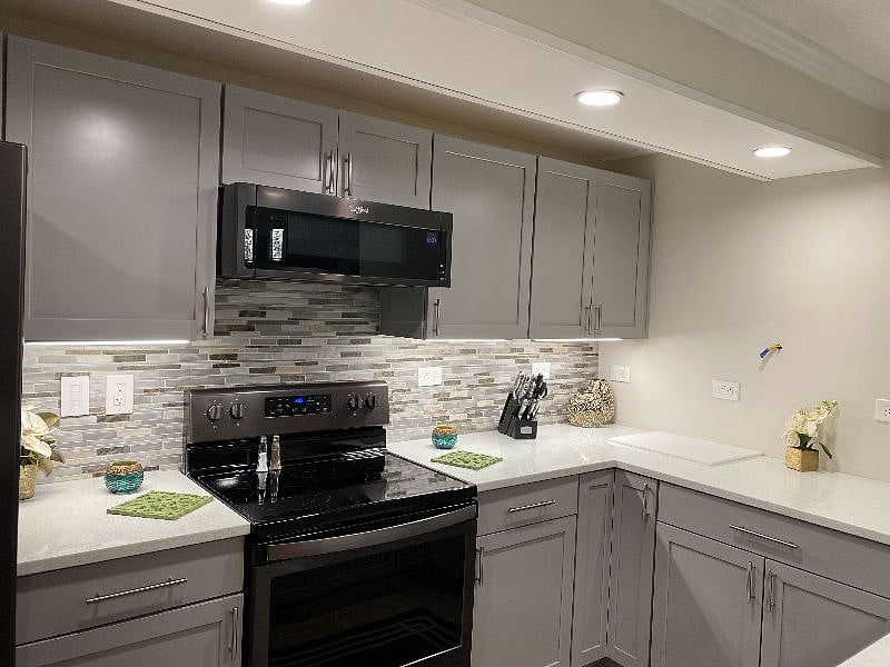 Beautiful, kitchen, with all the dishes, pots and pans, baking pans.
