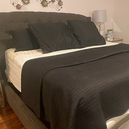 King size bed with adjustable base to raise and lower the head and legs to customize comfort