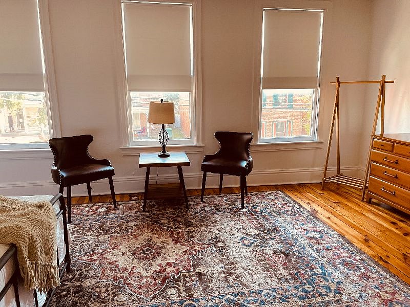 Each bedroom has a personal sitting space, dresser, and closet space.