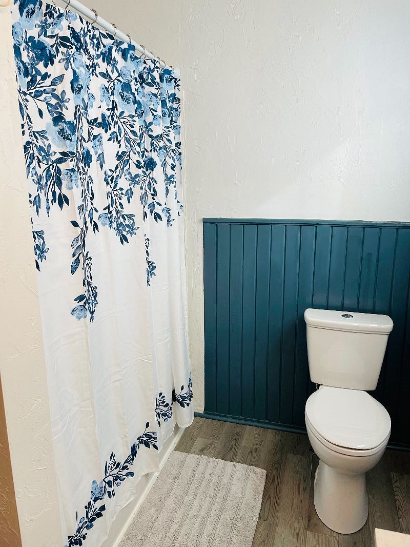 Bathroom with shower and bathtub.
