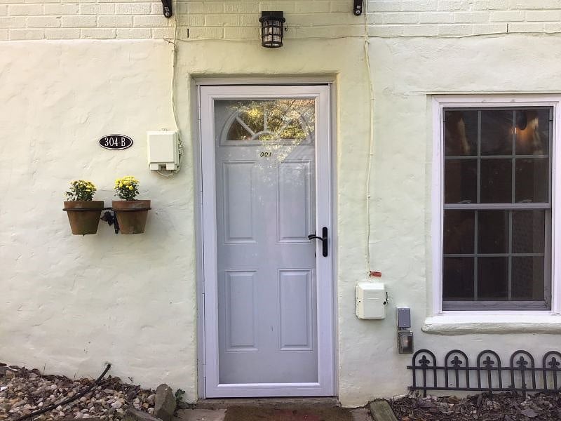 Entrance door off private driveway