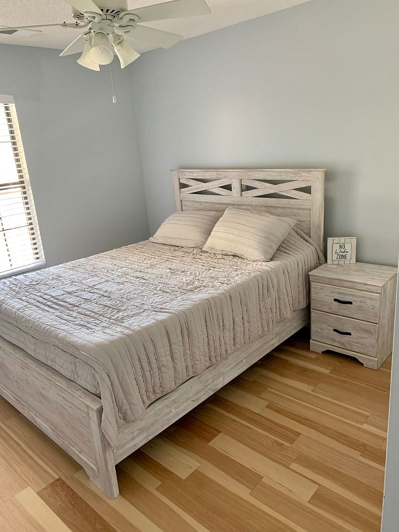 Second bedroom with Queen bed, dresser, and night stand