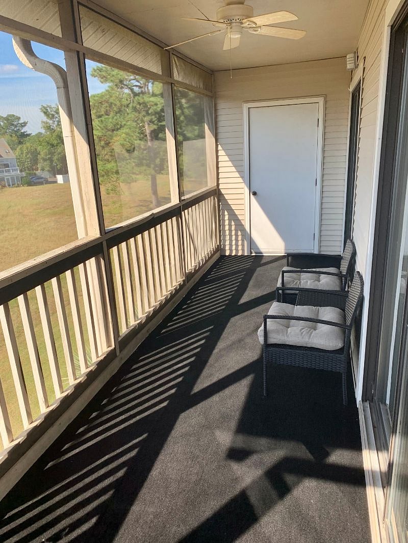 Screened in outdoor patio with two sliding doors from living room and Master bedroom