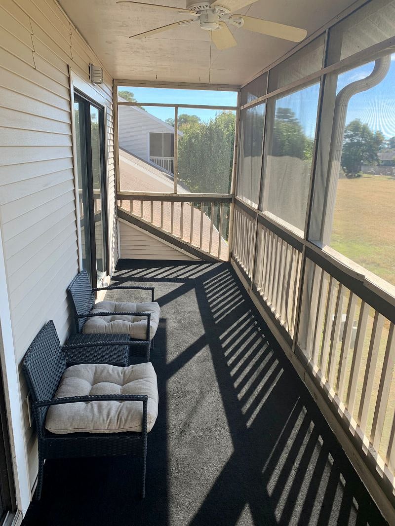 Screened in outdoor patio with two sliding doors from living room and Master bedroom