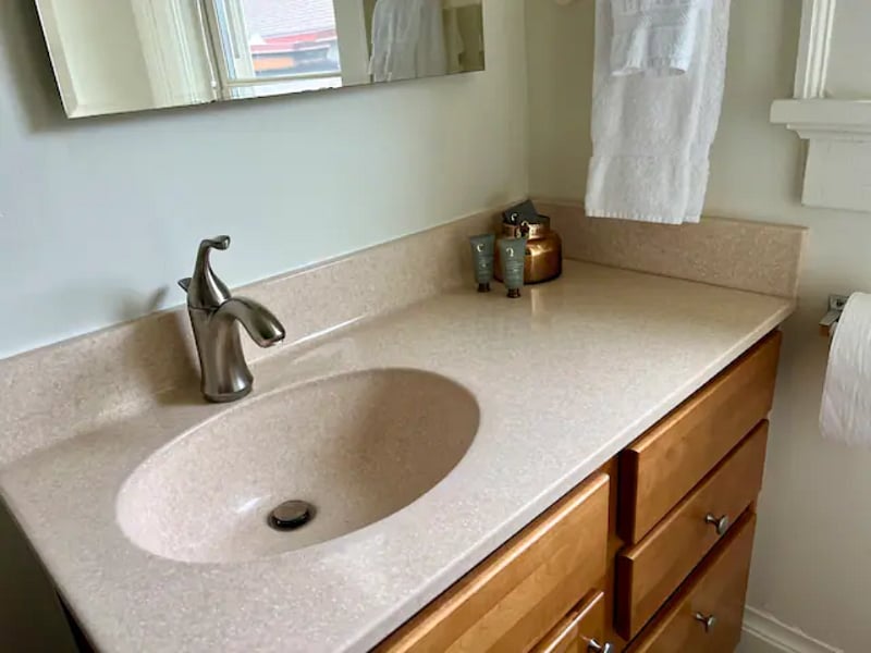 Bathroom. Complimentary soap and shampoo included.