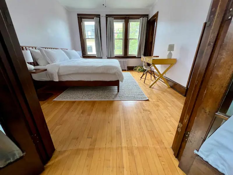 Front bedroom with armoire.