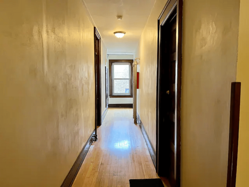 Apartment entrance. Laundry room is one door down on the right.