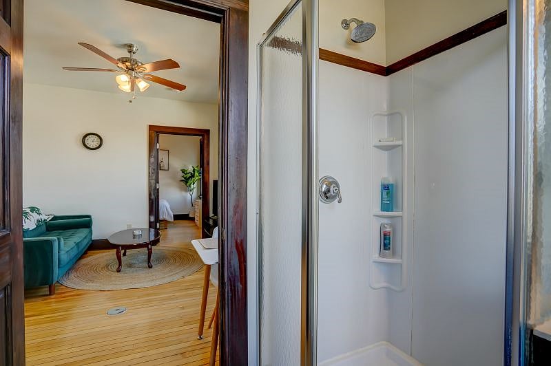 Bathroom with walk-in shower.