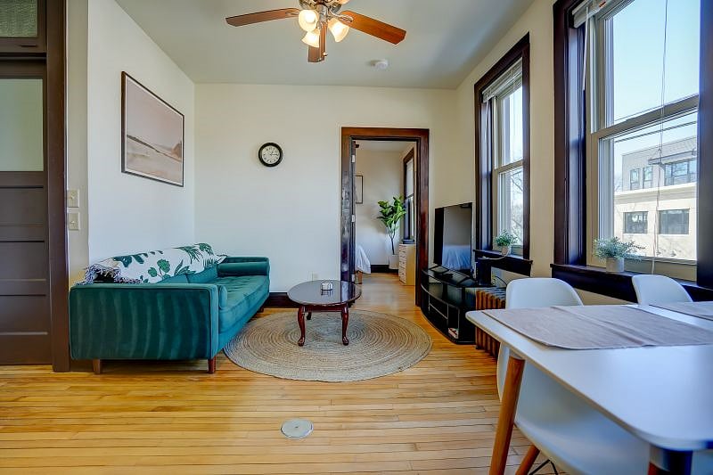View of living room from bathroom entrance.