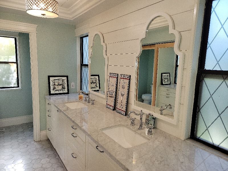 Very desired master bathroom has been updated with dual sinks and walk in closet.