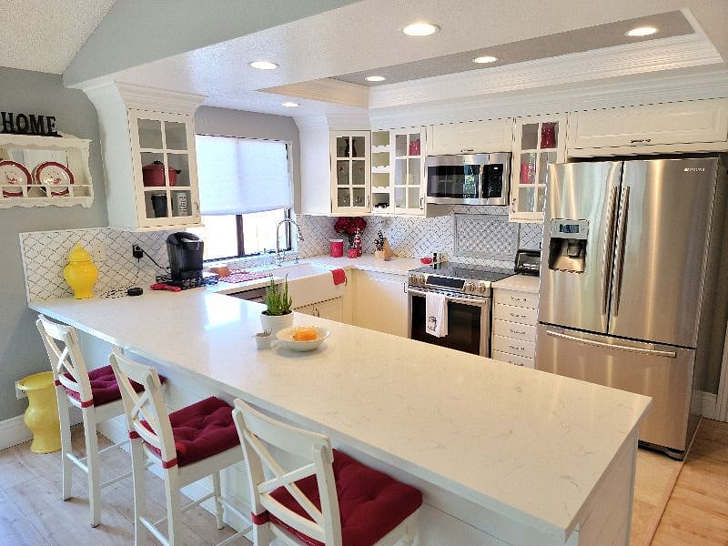 Updated kitchen is loved by all! The long peninsula makes for wonderful conversations with friends!