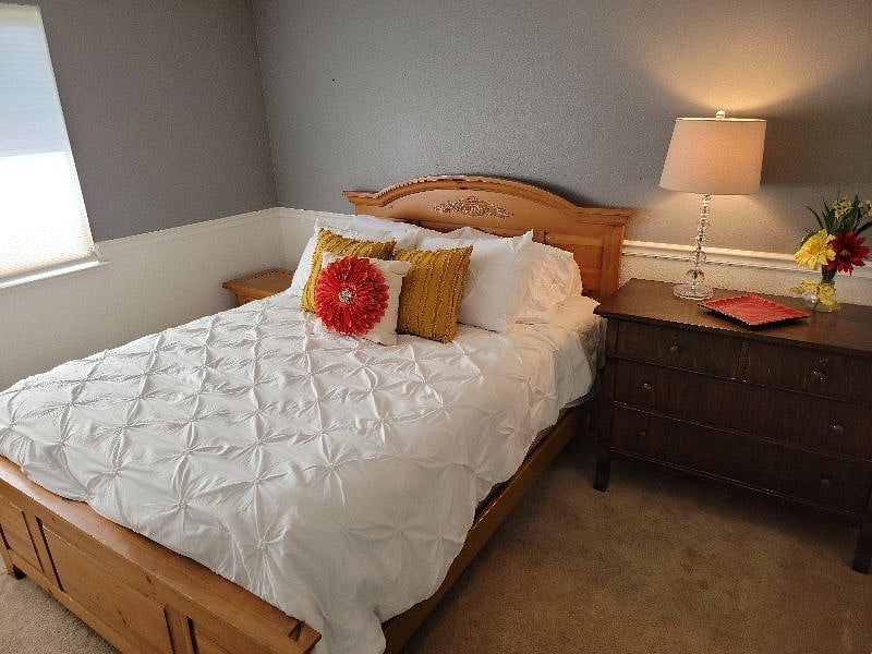 One of the two guest bedrooms. Warm and inviting!