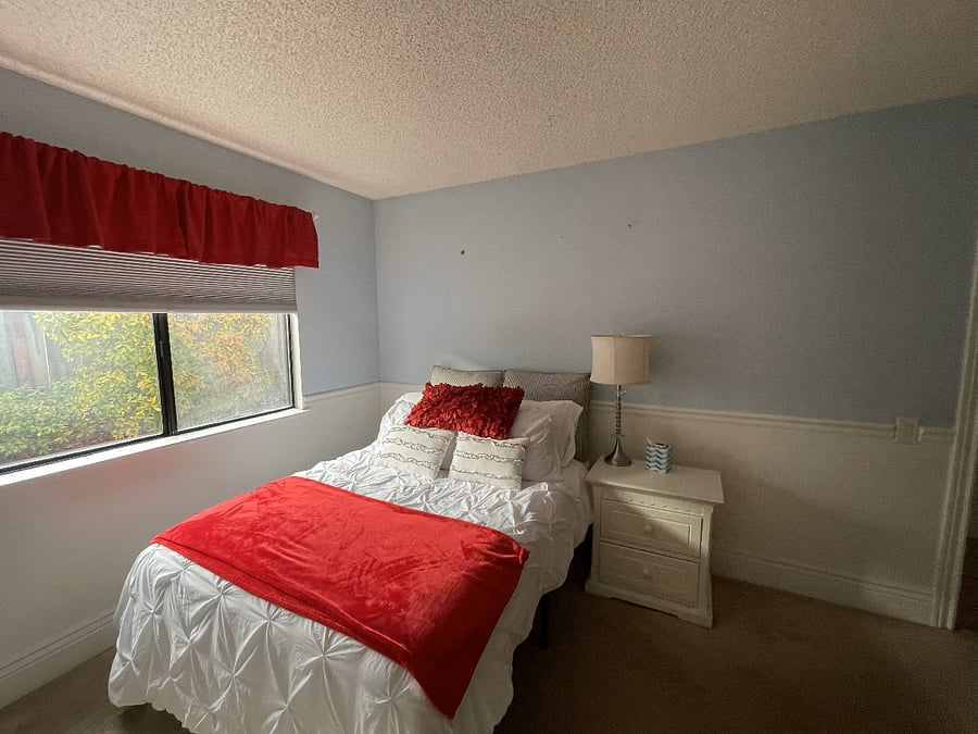 Bedroom #3 - double bed. Closet and entry to room is to the right in the photo.