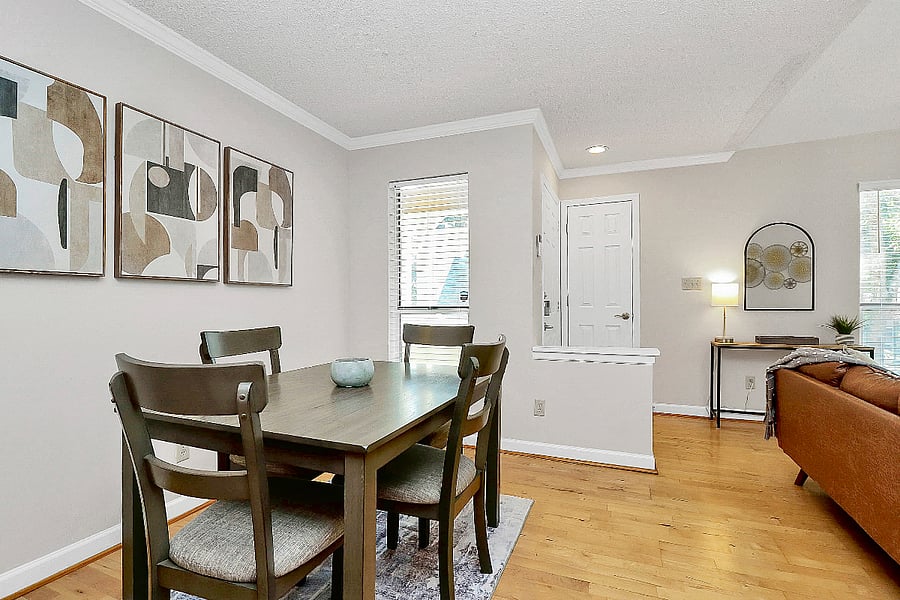 Gather at the table for a great meal in this cozy dining area