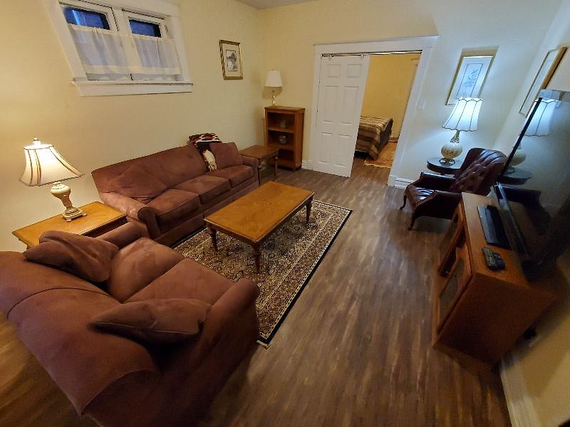 Another view of living room looking towards bedroom. Living/bedroom have a sliding door that can be closed for extra privacy.