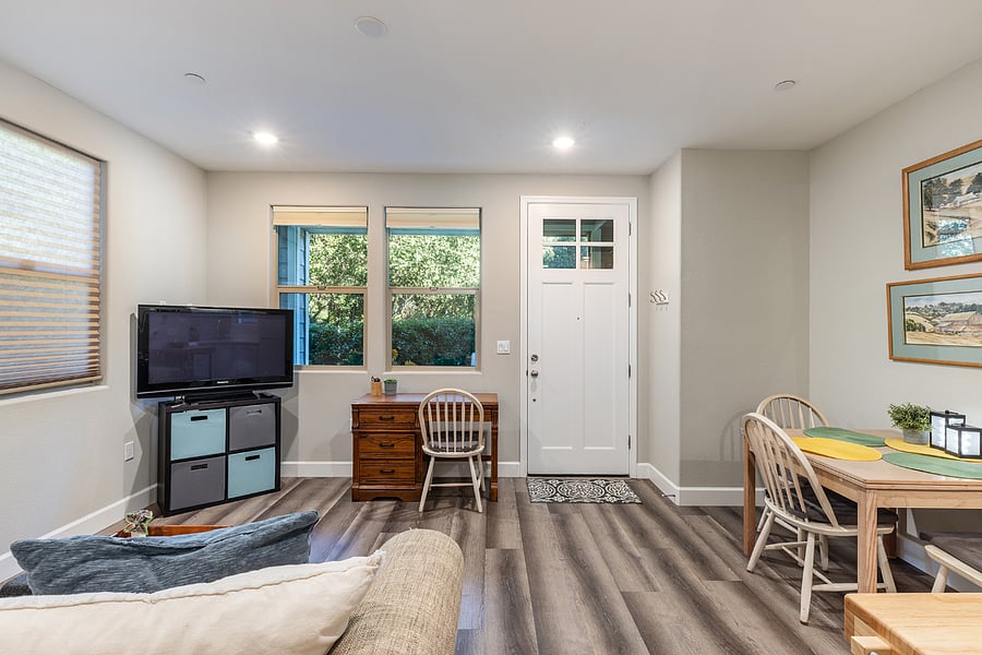 View of living room dining room from bedroom door. 