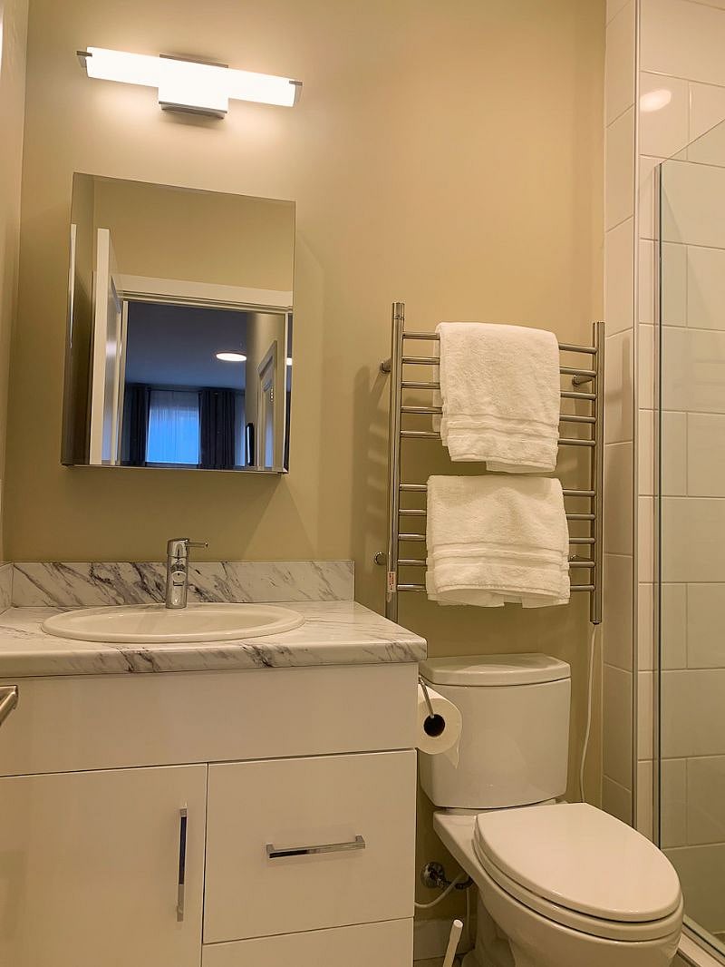 Bathroom with towel warmer