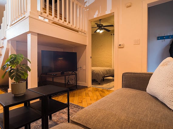 Family room area and stairs to upstairs