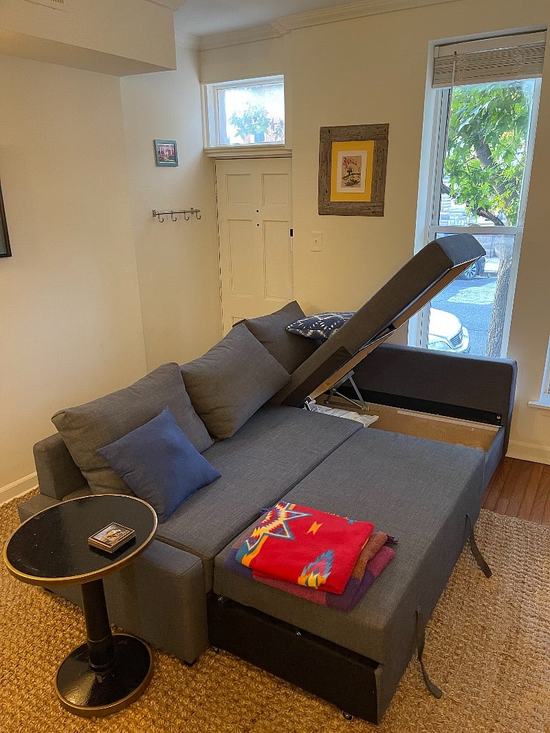 Couch storage under the chaise lounge