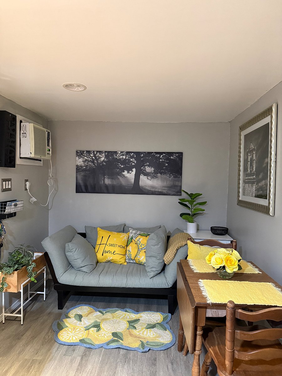 When you walk in to your left there is a sitting area The sitting area is prefect foe relaxinf and reading a book. You can sit & drink some wine or coffee and enjoy the sound of the birds that come by and visit.