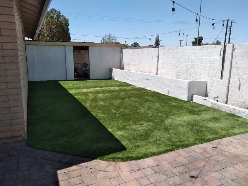 Play/Relaxing area in the backyard with artificial turf