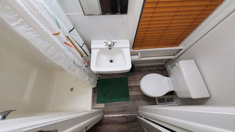 Here is the main floor bathroom. It's tiny, but convenient to have a shower right next to the laundry room on the main floor.