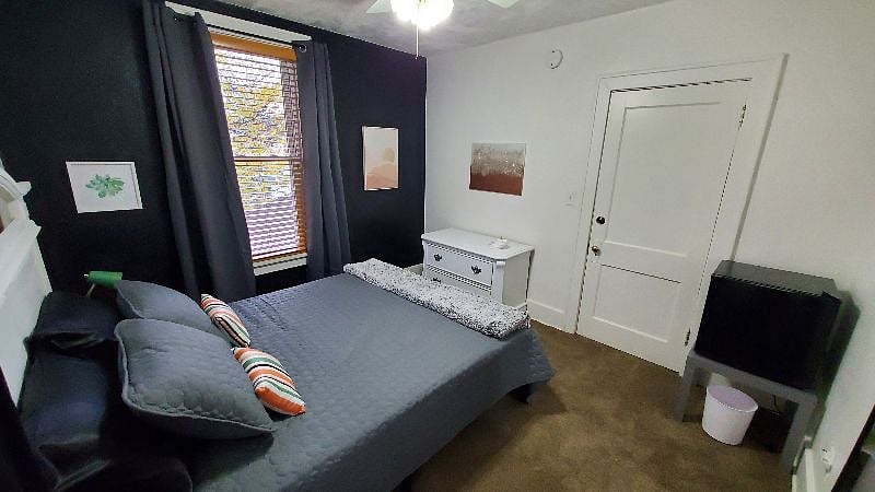 Room 3: There's a mini fridge for keeping your items chilled and handy.