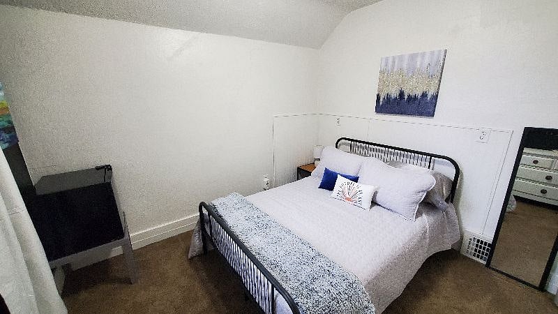 Room 4: There's a mini fridge for keeping your items chilled and handy.
