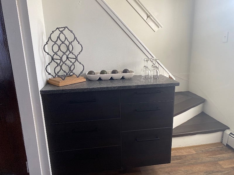 Wine area/extra storage for non-perishables. 
