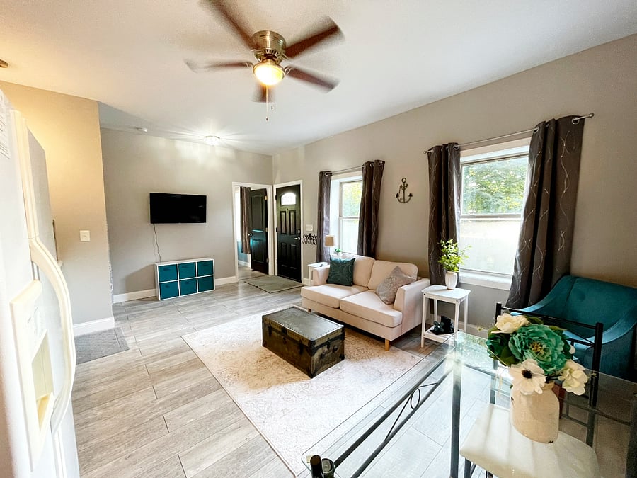 Wide angle photo of the bright and airy living space